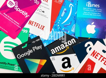 Montreal, Canada - March 24, 2020: Spotify green gift card in a hand at  store over gift cards. Spotify is an international media services provider,  we Stock Photo - Alamy