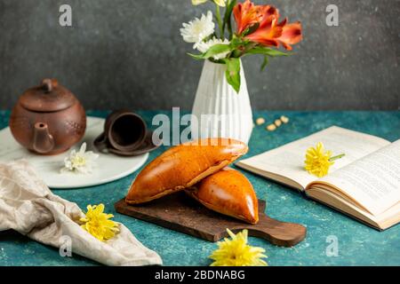 freshly baked buns on the cutting board Stock Photo