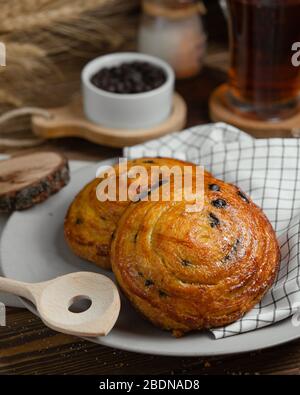 freshly baked buns with raisins Stock Photo