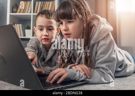 2 kids browsing internet Stock Photo