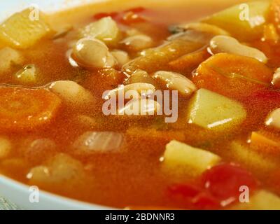 Israeli White Bean Soup, chicken broth and beans. Stock Photo