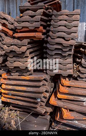 excess roof tiles stacked as a reserve Stock Photo