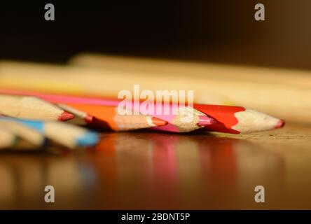 Colorful wooden pencils on a table selective focus Stock Photo