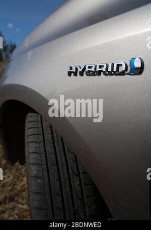 Toyota Auris Hybrid logo at 2013 model Stock Photo