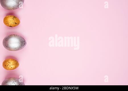Beautiful easter eggs on a pink background. Stock Photo