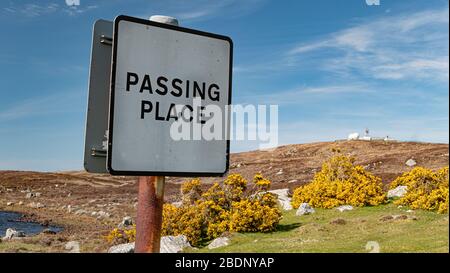 Passing place sign as seen on the many narrow roads throughout the highlands of Scotland in the UK Stock Photo