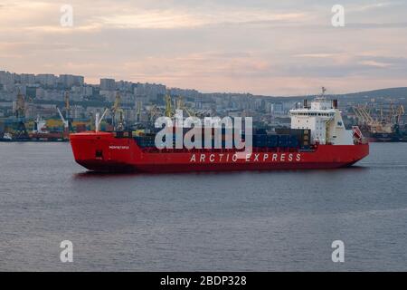Murmansk, Russia - August 18, 2019: The Monchegorsk bulk carrier floats in Kola Bay, near the port of Murmansk. Stock Photo