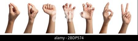 Isolated hand gestures and signals from Asian female child hand, multiple options. Includes clipping path. Stock Photo