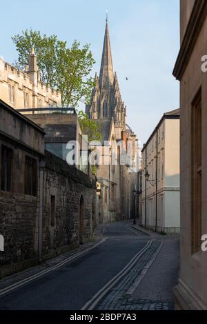 The spire of St. Marys Church rises above Magpie Lane in Oxford Stock Photo