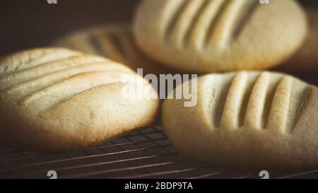 home made butter cookies with fork pressed design freshly baked  selective focus shot for copy space for recipes Stock Photo