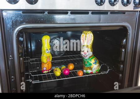 Ostereiersuche, Osterhase in Zeiten von Corona Virus - Easter egg hunt, Easter bunny in times of Corona Virus, stove Stock Photo