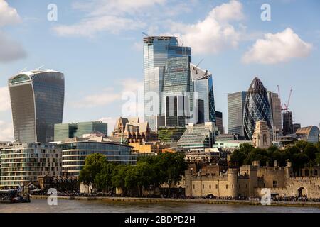 An elevated view of the North West shoreline of Greater London from atop of Tower Bridge showing The Gherkin office building and Tower of London. Stock Photo