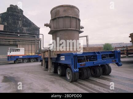 1991, heavy vehicles moving Crucibles at Sheffield Steel works,, South Yorkshire, Northern England, UK Stock Photo