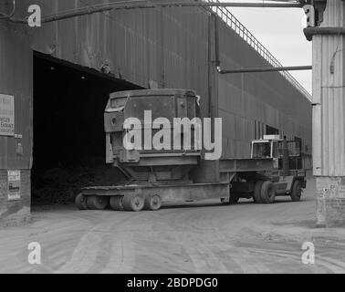 1991, heavy vehicles moving Crucibles at Sheffield Steel works,, South Yorkshire, Northern England, UK Stock Photo