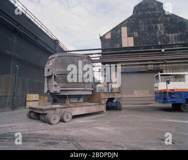 1991, heavy vehicles moving Crucibles at Sheffield Steel works,, South Yorkshire, Northern England, UK Stock Photo