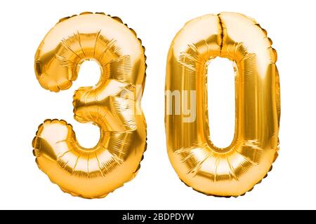 Number 30 thirty made of golden inflatable balloons isolated on white. Helium balloons, gold foil numbers. Party decoration, anniversary sign for Stock Photo