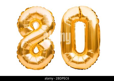 Number 80 eighty made of golden inflatable balloons isolated on white. Helium balloons, gold foil numbers. Party decoration, anniversary sign for Stock Photo
