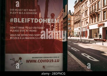LUXEMBOURG CITY /  APRIL 2020: Info bilboards about the Coronavirus global andemic at the bus stops Stock Photo