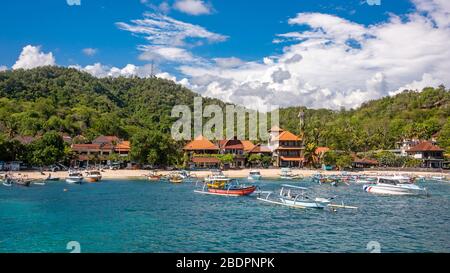 Horizontal panoramic of the coastline of Padang Bai in Bali, Indonesia. Stock Photo