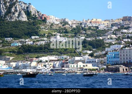 Capri, Italy: Panoramic view from the Marina Grande to the town in the hills up above. Stock Photo