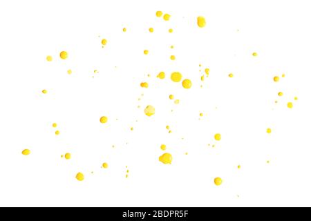 Drops of yellow paint isolated on a white background. Nail polish splatters. Abstract art texture background Stock Photo
