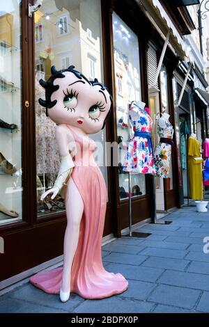 A rare large Betty Boop model figure standing on display in front of a shop. Trieste, Friuli Venezia Giulia, Italy, Europe, EU Stock Photo