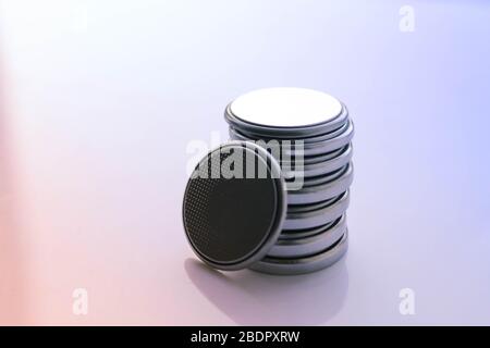 Miniature battery button cell. with chemical data. Stock Photo