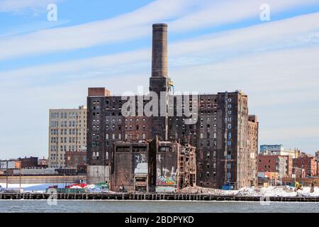 Abandoned Domino Sugar Refinery by East River in Williamsburg, Brooklyn, New York City, United States of America Stock Photo