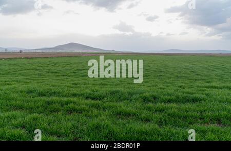 Dramatic black and red clouds with sunbeam over adacal hill, Emirdag, Afyonkarahisar, Turkey Stock Photo