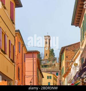 Old street and bell tower in Santarcangelo di Romagna town, Emilia-Romagna,  Italy Stock Photo