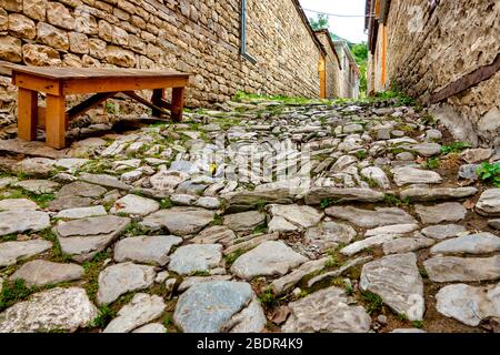 Traditional stone paved alley in Lahij, Azerbaijan Stock Photo