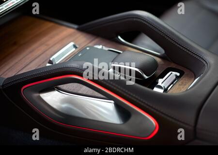 Touch control panel for multimedia system in a modern car. Stock Photo