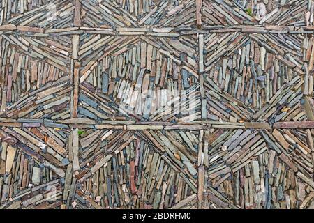 Pavement background symmetry of colorful slate stones Stock Photo