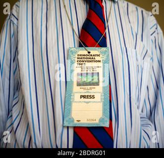 A man wears his Democratic National Convention press identification from the 1992 convention, held in New York in this photo illustration on Thursday, April 2, 2020. The DNC has announced that it has pushed the 2020 Milwaukee convention to the week of August 17. (© Frances M. Roberts) Stock Photo