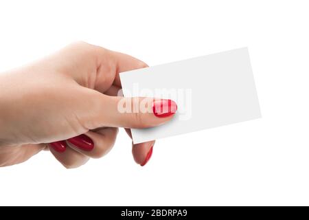Female hand holding a business card isolated on white background. With cliping path elements Stock Photo