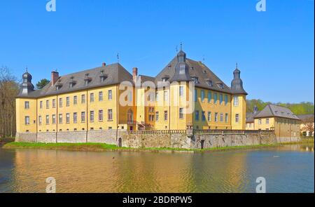 German yellow water castle Schloss Dyck in spring Stock Photo