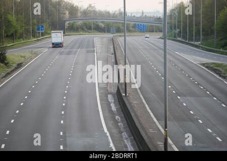 Bromsgrove, Worcestershire, UK. 9th Apr, 2020. An extraordinarily quiet M5 motorway southbound near Birmingham on the Thursday afternoon before the Easter Bank Holiday weekend, as people obey the government instructions to stay away from tourist areas and stay at home. Under normal circumstances, the southbound carriageway is busy with caravans, campervans and tourist traffic from the midlands making their way south for the weekend. Only a few cars and lorries can be seen. Credit: Peter Lopeman/Alamy Live News Stock Photo