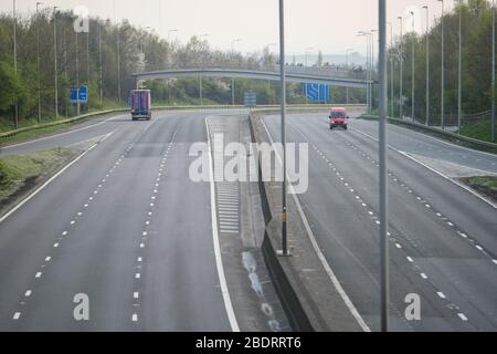 Bromsgrove, Worcestershire, UK. 9th Apr, 2020. An extraordinarily quiet M5 motorway southbound near Birmingham on the Thursday afternoon before the Easter Bank Holiday weekend, as people obey the government instructions to stay away from tourist areas and stay at home. Under normal circumstances, the southbound carriageway is busy with caravans, campervans and tourist traffic from the midlands making their way south for the weekend. Only a few cars and lorries can be seen. Credit: Peter Lopeman/Alamy Live News Stock Photo