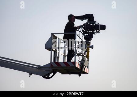 A general view of  a television crew member at Cheltenham Racecourse during the 2016 Cheltenham Race Festival. Lewis Mitchell Stock Photo