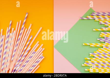 frame with colorful paper drinking straws. nature friendly biodegradable materials. Birthday party holiday celebration background.Minimalistic zero Stock Photo