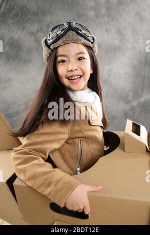 Paper airplane driving happy children Stock Photo