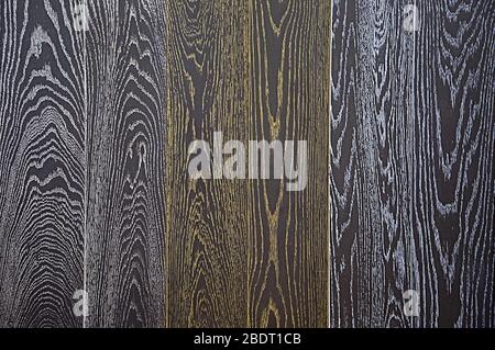 Wood texture. Black background of a boards . It is painted by a bronze and white patina. Stock Photo