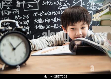 Happy learning of primary school boy Stock Photo