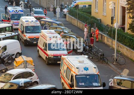 Florence, Italy. 09 April, 2020. Coronavirus positive patients were transferred from the nursing home in Florence with the intervention of numerous ambulances. The transfer of guests of the Rsa San Giuseppe began in the late afternoon today. Florence, Italy. Credit: Mario Carovani/Alamy Live News. Stock Photo