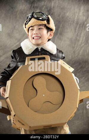 Happy children's driving paper airplanes Stock Photo