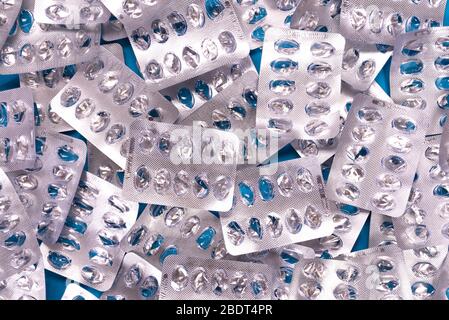 Background from many empty cachets of medical supplies, pills and capsules Stock Photo