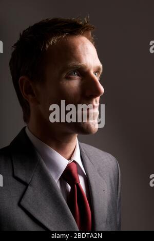 Profile portrait of a businessman in head and shoulders close-up Stock Photo