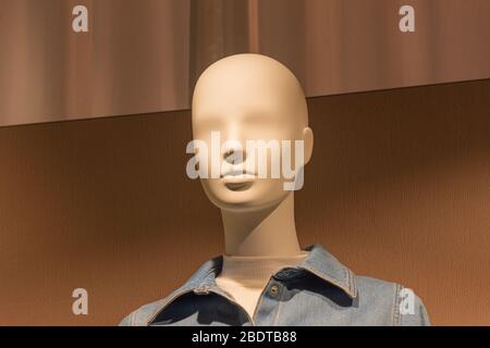 Italy, Milan, February 13 2020, fashion shop window with mannequins and clothes Stock Photo