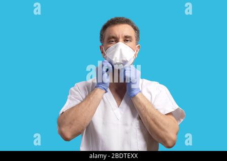 medical worker is wearing ffp3 protective mask against coronavirus Stock Photo