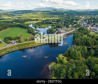 The Ammonoosuc River flows into the Connecticut River in the village of Woodsville, Haverhill, New Hampshire Stock Photo